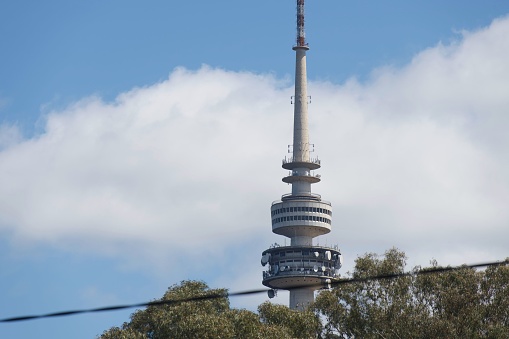 The Telstra Tower with a cloudy sky background