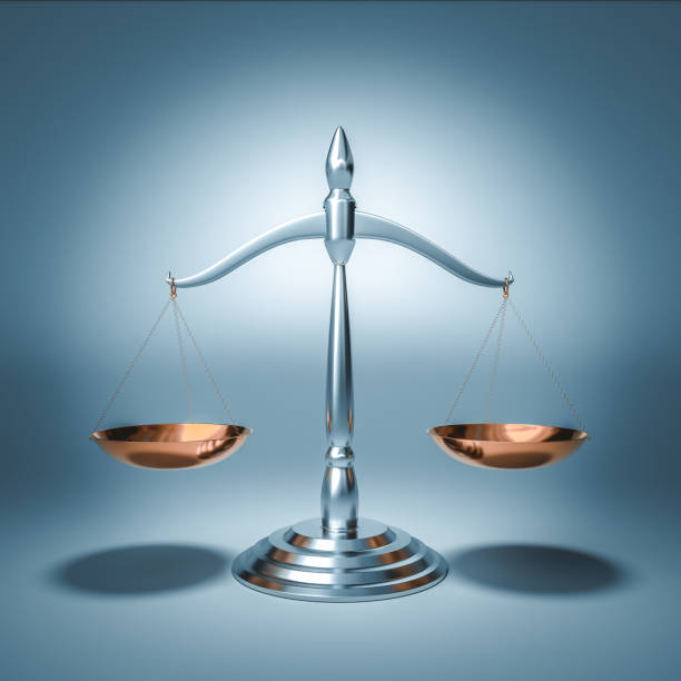 istock scales of justice with gold plates. 1435297895