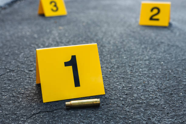 istock Crime Scene Evidence Markers With Bullet Casing 1435303794