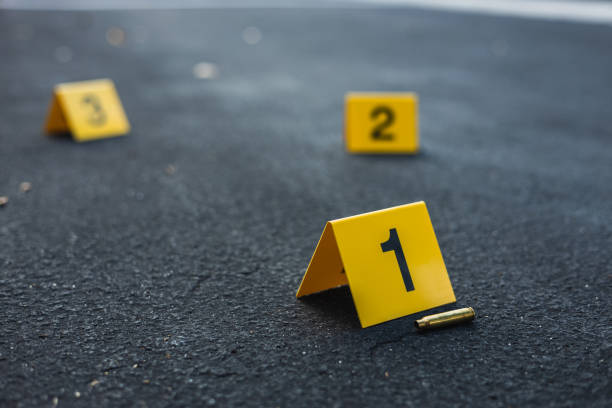 istock Crime Scene Evidence Markers With Bullet Casing 1435303868