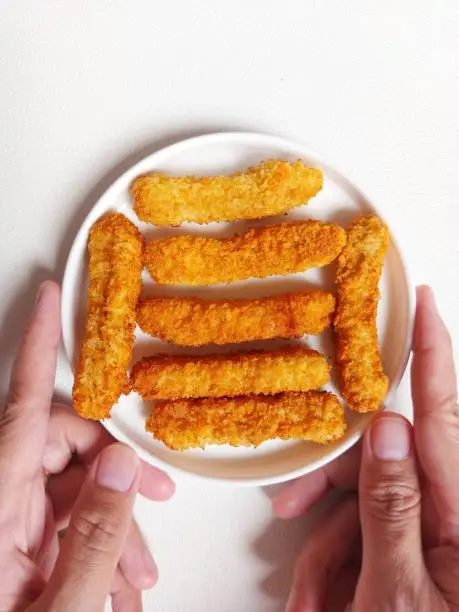 Photo of Chicken fingers or chicken goujons,  strips,  tenders,  nuggets, fillets.