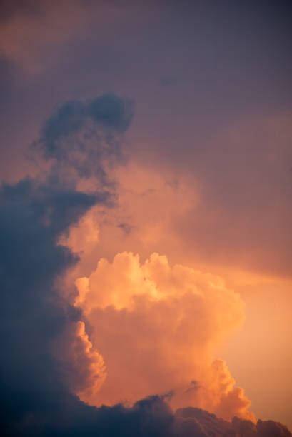 istock Intense glowing clouds at sunset with negative space for copy. 1435314987