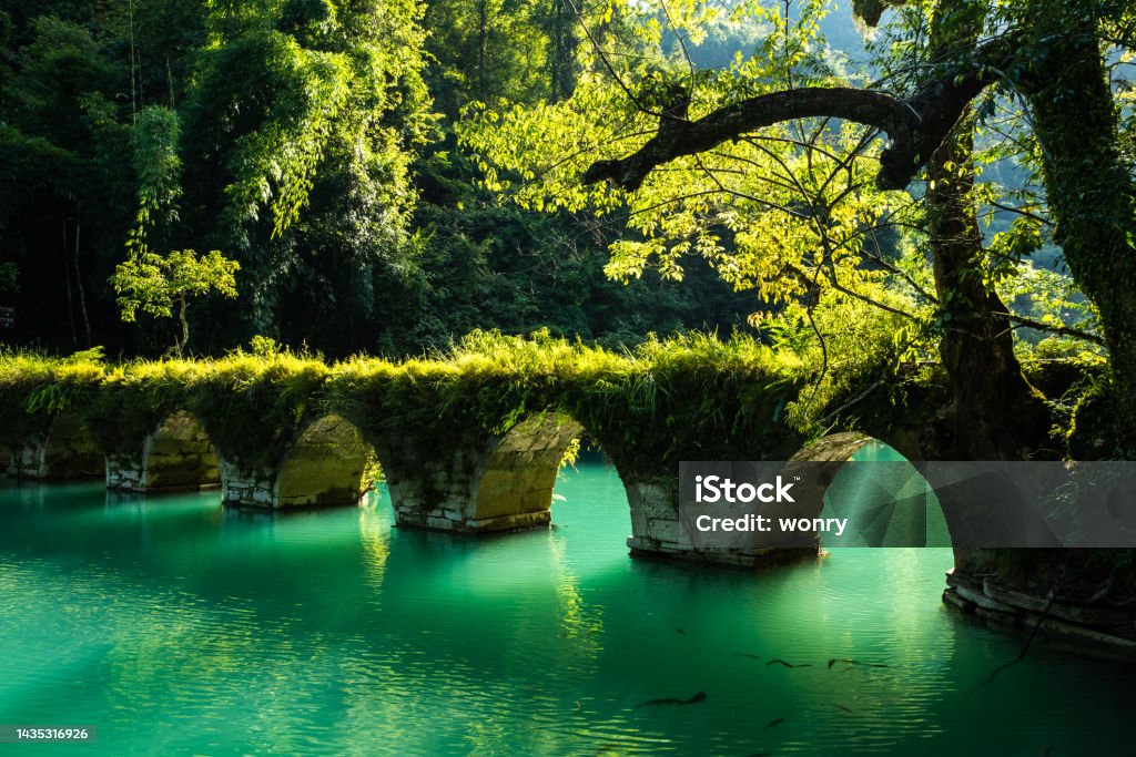 Seven Small Arches (Xiaoqikong) Scenic Area at Libo Country, Guizhou Province Arch - Architectural Feature Stock Photo