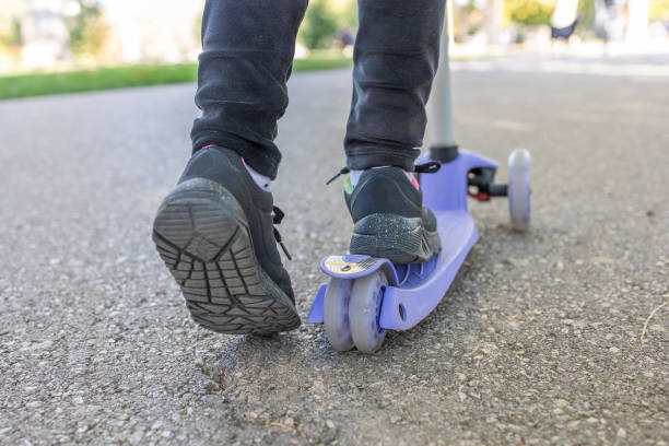 istock A girl with a scooter 1435319151