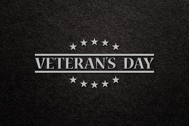 istock Text Veterans Day on black textured background. American holiday typography poster. 1435321022