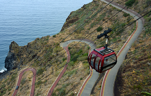 Cable Car transporting people down the cliffs of Garajau  Madeira  Portugal.