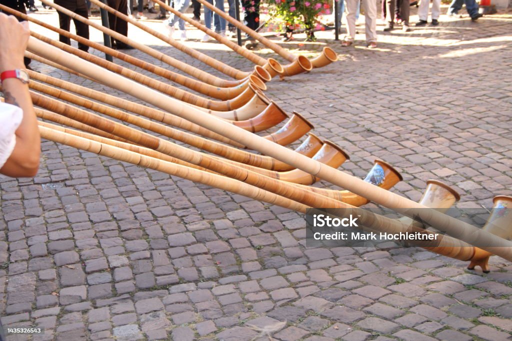 Street music with the alphorn Adult Stock Photo
