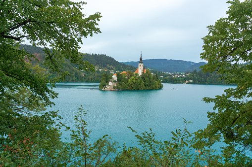 Church of the Mother of God on Bled island in turquoise Bled lake, Slovenia.