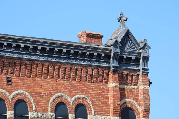 istock Historic religious cornice of the building against a blue sky 1435337762