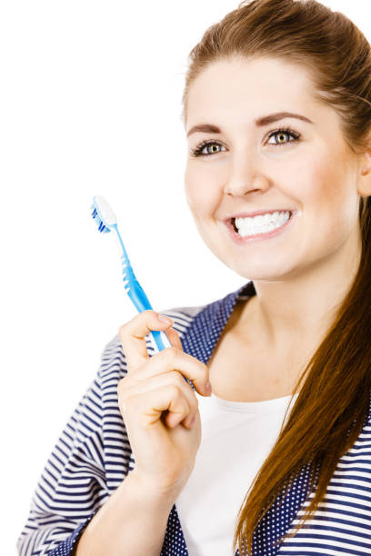 istock Woman brushing cleaning teeth. 1435338807