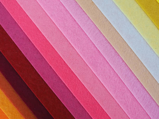 istock Colorful background, A stack of colorful fabric. Full frame shot of multi colored fabric background 1435340040