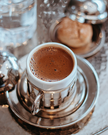 Turkish coffee is a rich, thick, and delightful drink to be enjoyed slowly with good company. It is brewed in a copper coffee pot called a cezve (jez-VEY), made with powder-like ground coffee, and sweetened to the drinker's taste.