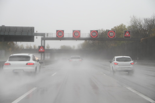 Cars in the rain on the highway