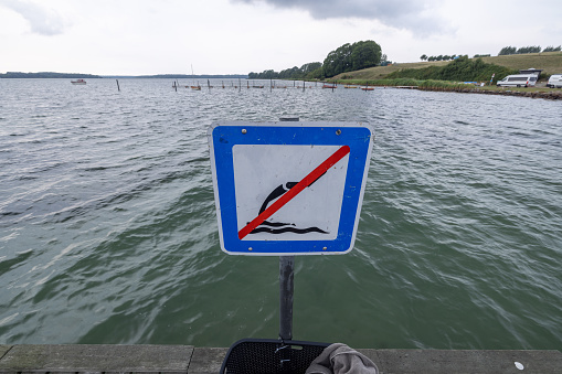 warning sign of dangerous current in ocean