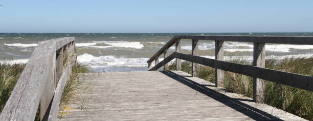istock a wooden bridge as access to the beach 1435348404