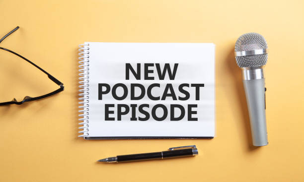 istock New Podcast Episode message with a microphone. 1435349921