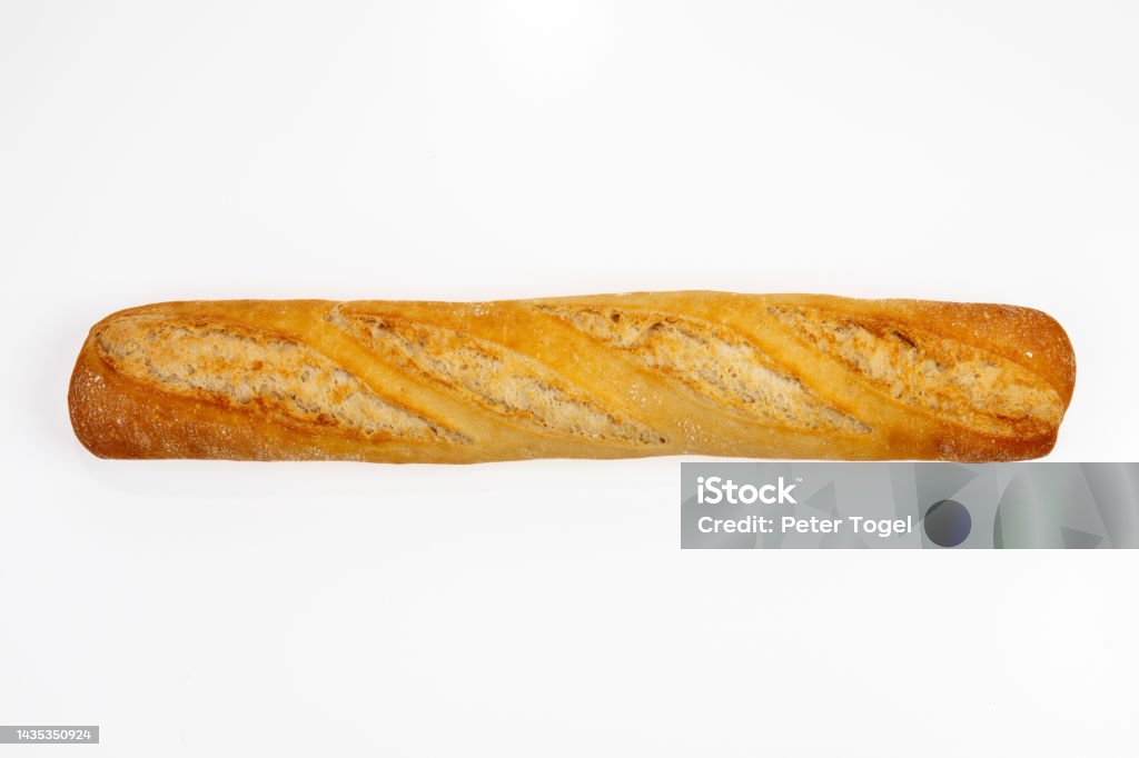 Freshly baked quality baguette on white background top view Baguette Stock Photo