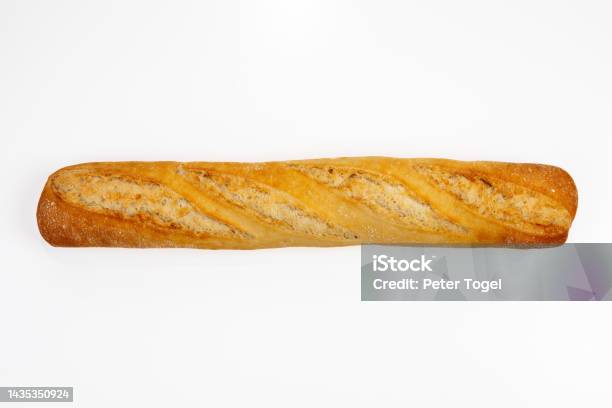 Freshly Baked Quality Baguette On White Background Top View Stock Photo - Download Image Now