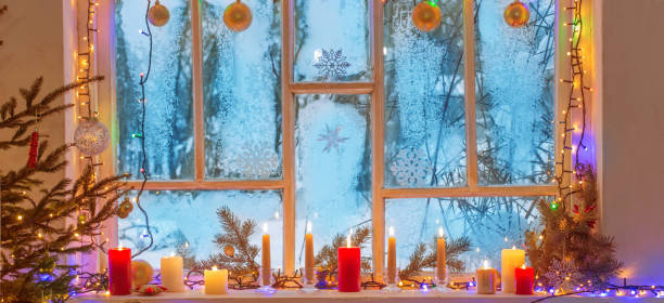 istock Christmas decorations on old wooden window 1435351835