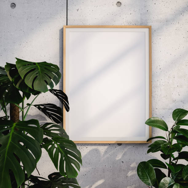 istock Blank frame on concrete wall near green plants. 3d render 1435351971