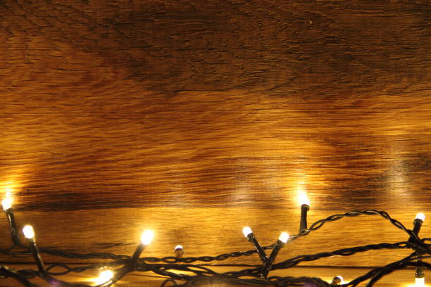 istock wooden board with fairy lights 1435352825