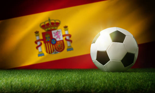 istock Spain national team background with ball and flag 1435352855