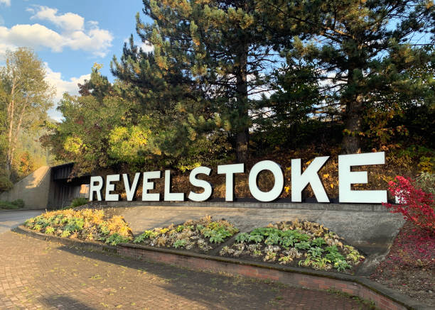 Welcome to Revelstoke Looking at the Revelstoke, British Columbia sign as you enter the town. revelstoke stock pictures, royalty-free photos & images