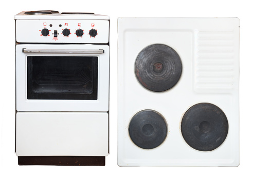 Old electric stove on a white background.