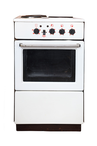 Old electric stove on a white background.