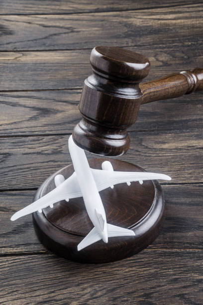 istock Judges gavel and toy airplane 1435370871