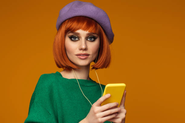 istock Beautiful emotional woman using smart phone 1435376793