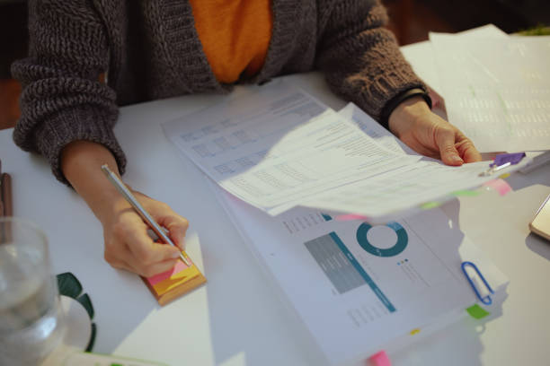istock tax time. accountant woman working with documents 1435378656