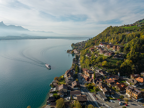 Aerial view of cruise ship pulling into dock in Spiez, Switzerland