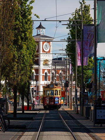 Christchurch, New Zealand - October 10, 2022: Tram and The Grand Cathedral Square in the city.
