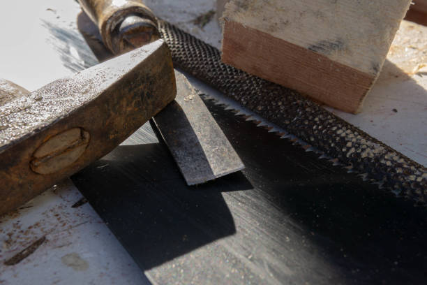 istock Hammer saw and chisel resin for woodworking needed for timber construction, tools used in construction work on wood 1435388118