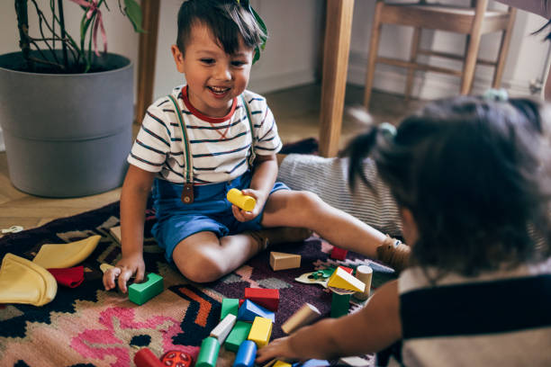 istock Brother And Sister Playing Together 1435390382