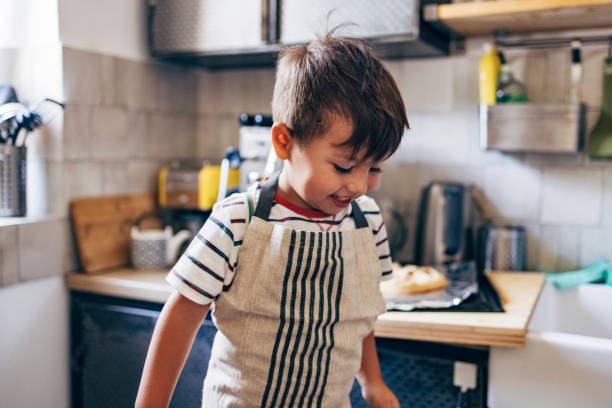 istock Portrait Of A Boy In The Kitchen 1435390473