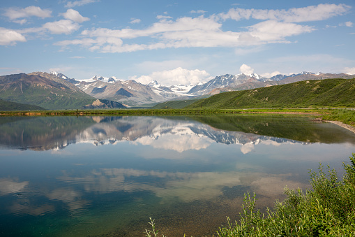 HDR of Summit Lake at the base of the Alaska Mountain Range in Valdez, Alaska.