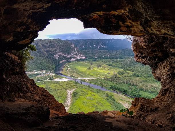 istock Beautiful view of a landscape with a river and fields from a cave 1435393413