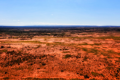 Endless plains of red soil semi-desert outback of Australia around Broken hill city on Barrier highway - aerial landscape.