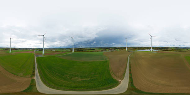 360 degrees spherical panoramic shot of wind turbines in a rural landscape
