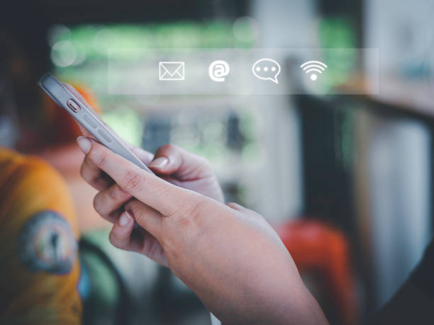 istock Businessman using Smart Phone with Chat message Customer support hotline .check email, call phone, address, Contact us people connection in the social world 1435434795