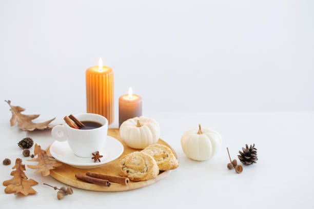 istock white cup of coffee with cozy decor on white table 1435445163