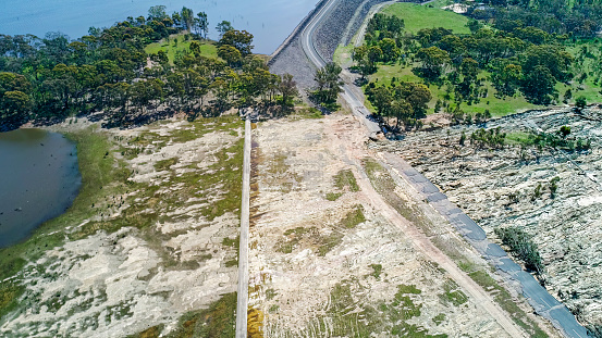 Drone views of Lake Eppalock in Heathcote Victoria with flood damage to the road from dam wall breach