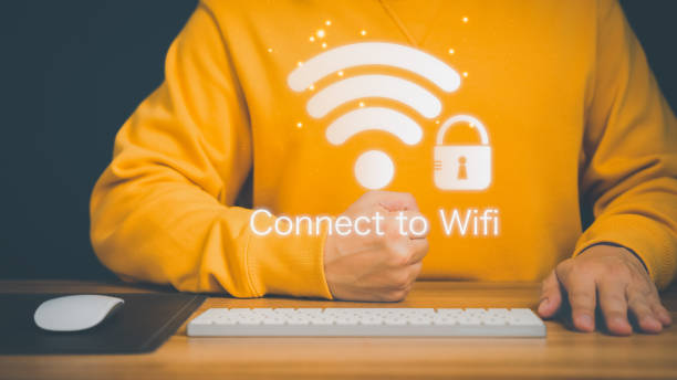 istock Man using a computer keyboard to connect to wifi and waiting to loading digital business data form website, concept technology of waiting for connect to wifi. 1435454952