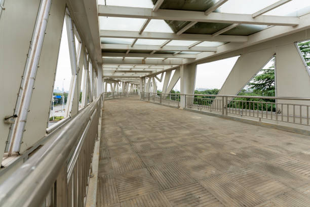 istock Inside of a modern overhead pedestrian bridge 1435458924