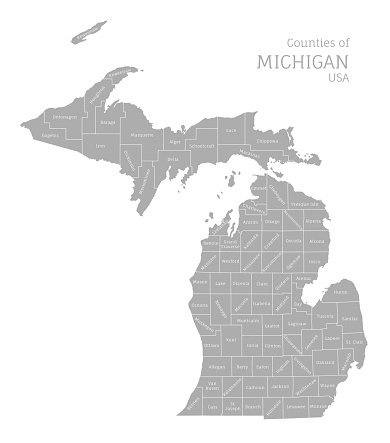 Highly detailed gray map of Michigan, US state. Editable administrative map of Michigan with territory borders and counties names labeled realistic vector illustration