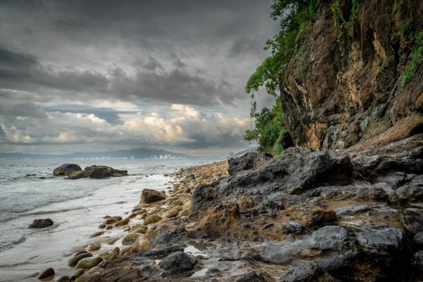 istock Rocky coast and island under a gloomy day 1435471497