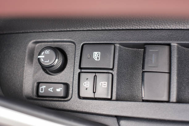 istock buttons controlling the windows inside a car, control and electric mirror adjustment 1435476832