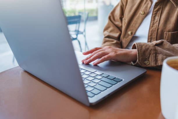 istock Closeup image of a woman working and touching on laptop computer touchpad 1435484164